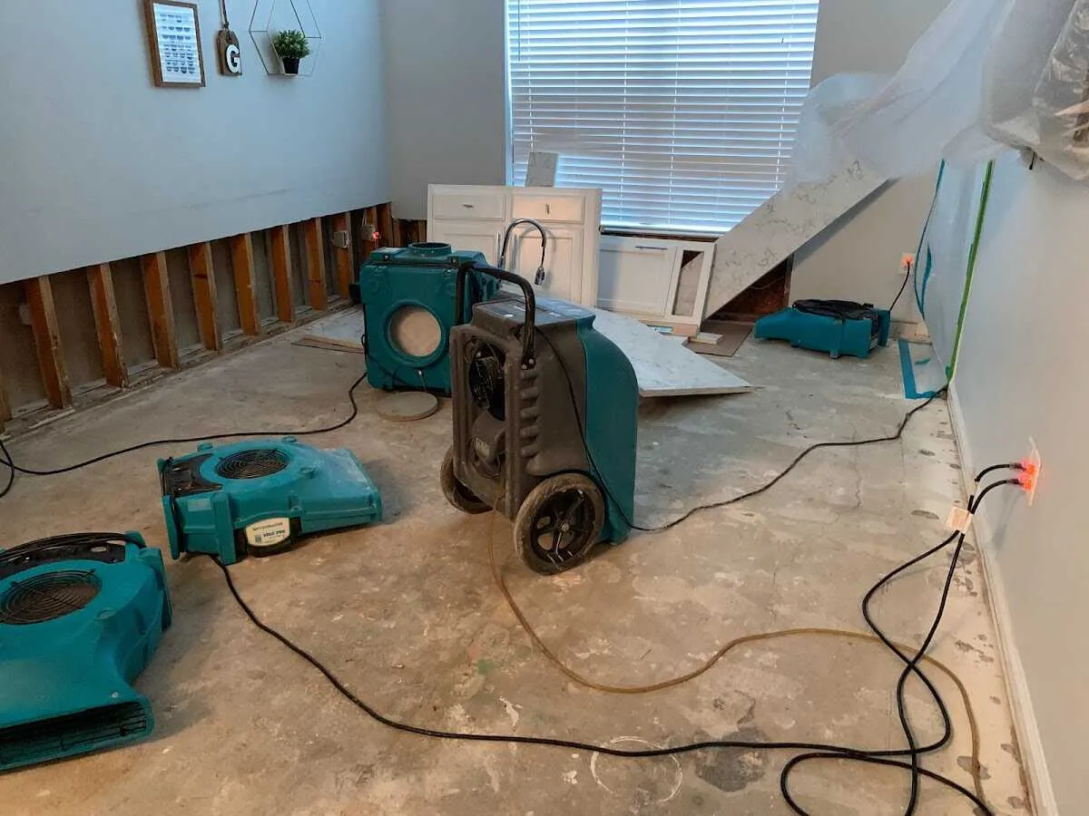 Dehumidifier in flood-cut room for Water Damage Restoration in Hurricane